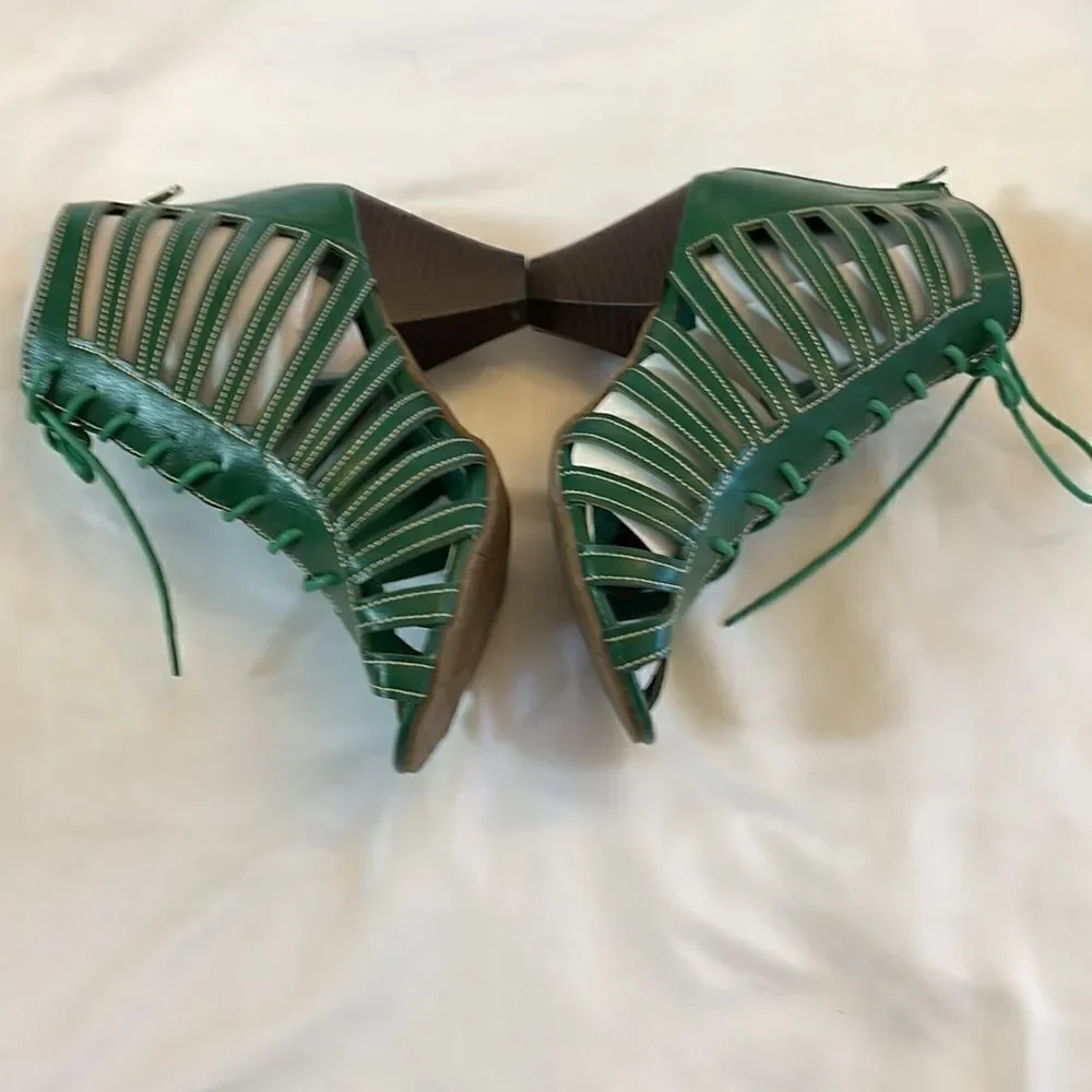 RASOLLI GREEN LACE UP CUT OUT SHOOTIES.  ZIP UP BACK. NEW IN BOX